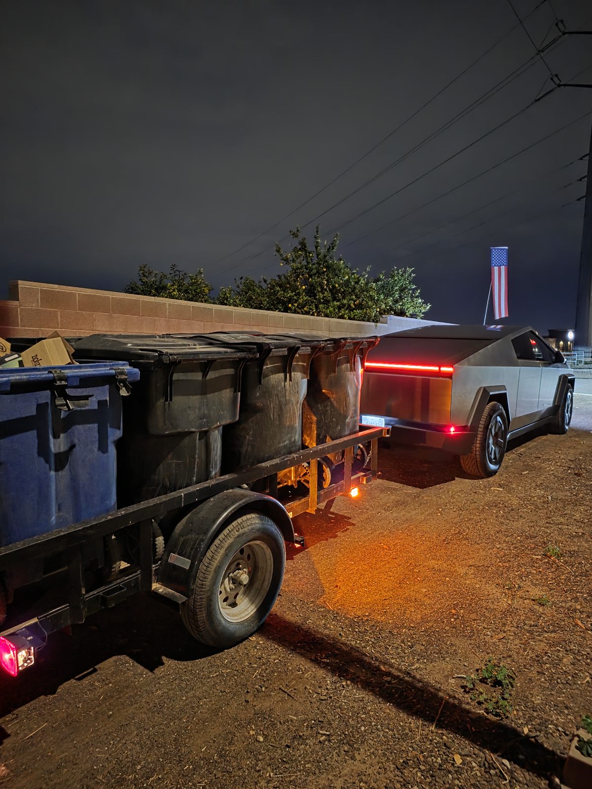 Cyber Hauler truck and trailer ready for junk removal pickup